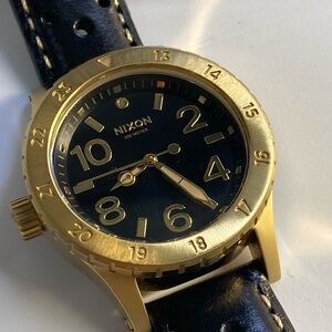 Nixon The 38-20, Refined, gold tones with black dial and strap, new battery